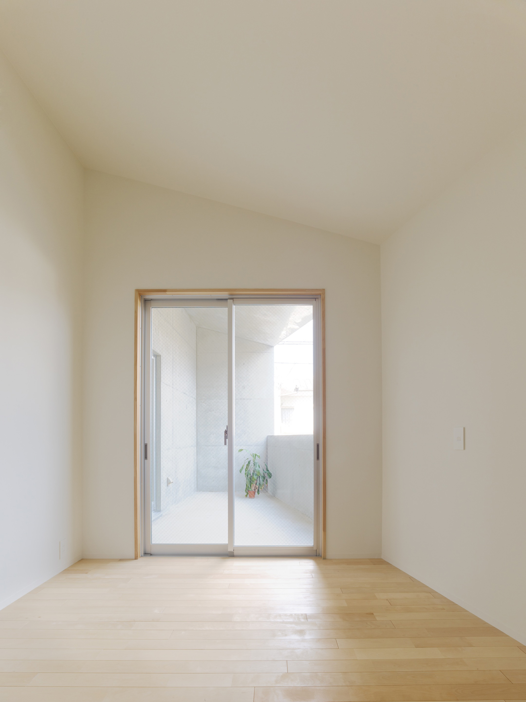 Casa en Kitaoji de Torafu Architects